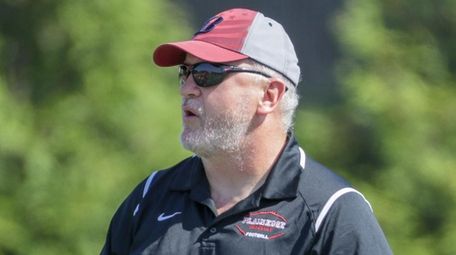 Plainedge head coach Rob Shaver watches the team