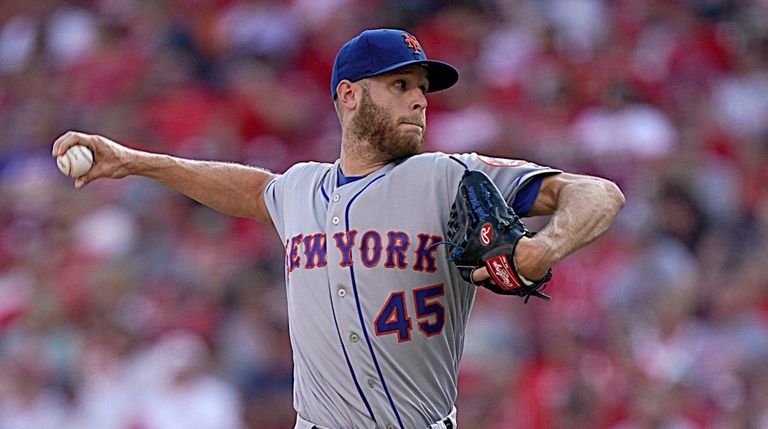 Zack Wheeler pitches during the game against the