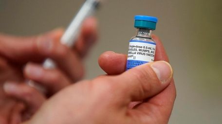 A dose bottle of measles, mumps and rubella