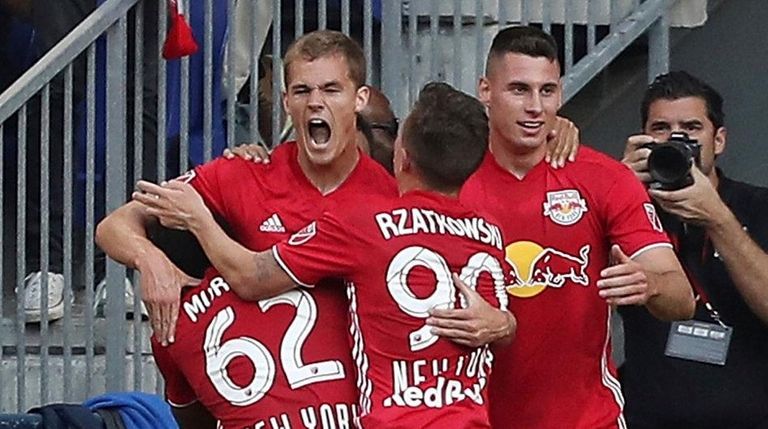 The Red Bulls celebrate afters forward Tom Barlow