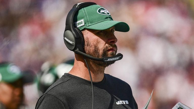 Jets head coach Adam Gase looks on