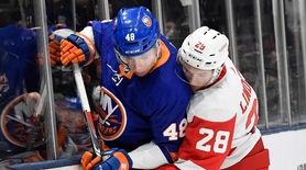 Otto Koivula of the Islanders and Gustav Lindstrom