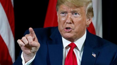 President Trump speaks during a meeting at the