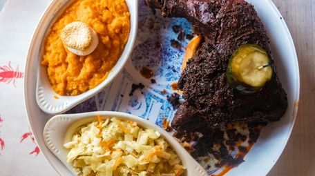 Nashville hot chicken is served with cole slaw