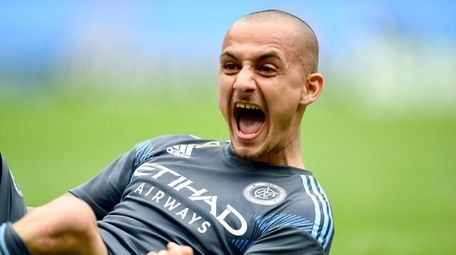 Alexandru Mitrita of New York City FC celebrates
