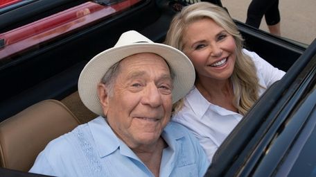 George Segal and Christie Brinkley appear in a