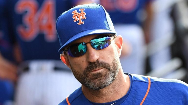 Mets manager Mickey Callaway looks on from the