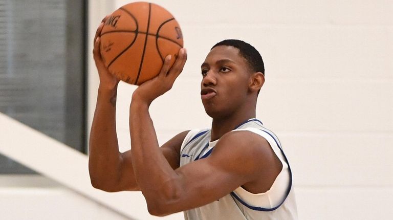 The Knicks' RJ Barrett shoots during training camp