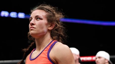 Miesha Tate reacts after losing her Strikeforce women's