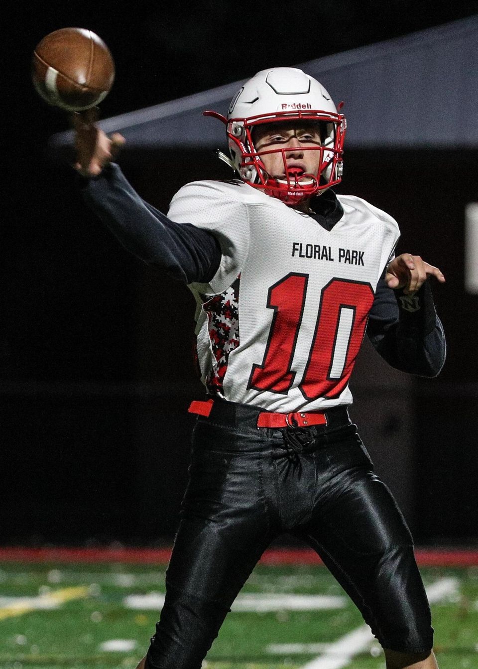 Floral Park quarterback Christopher Naronis passes during a