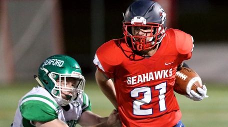 Cold Spring Harbor RB Jacob Bruno breaks the