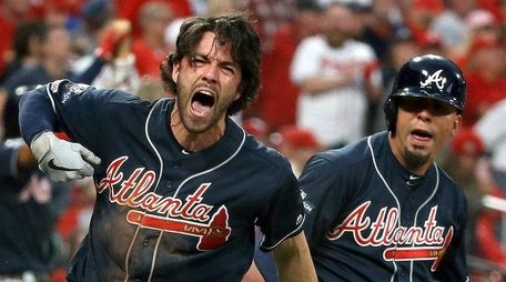Dansby Swanson and Rafael Ortega of the Atlanta