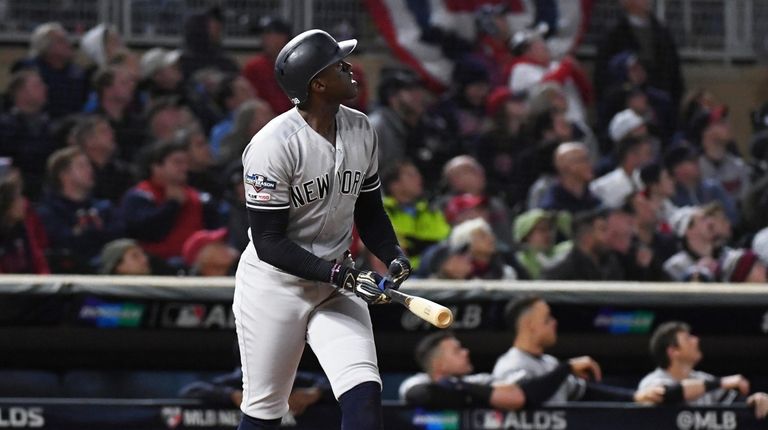 Cameron Maybin of the Yankees watches his home