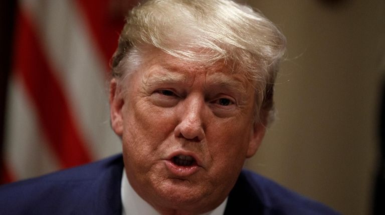 President Donald Trump participates in a briefing with