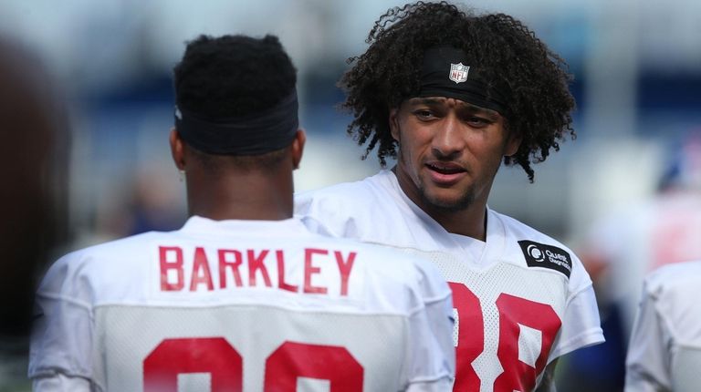 Giants tight end Evan Engram talks to running