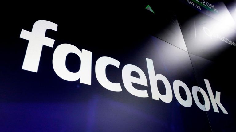 The Facebook logo on screens at the Nasdaq