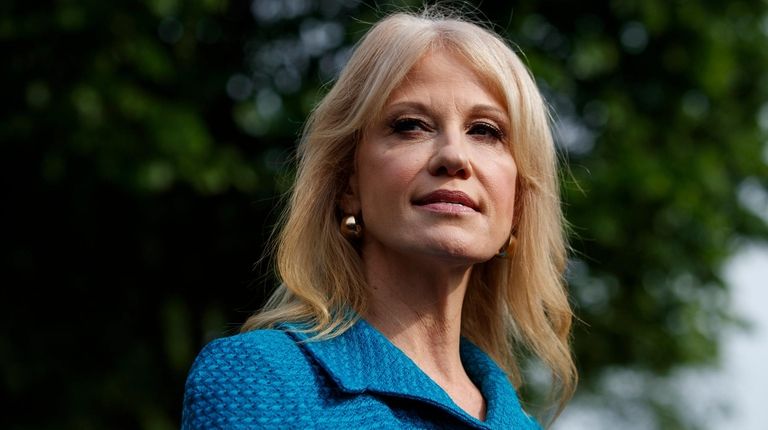 White House counselor Kellyanne Conway talks with reporters