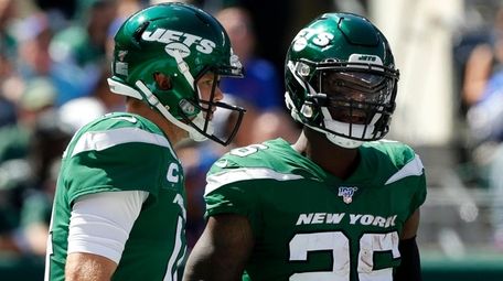 Le'Veon Bell and Sam Darnold of the Jets