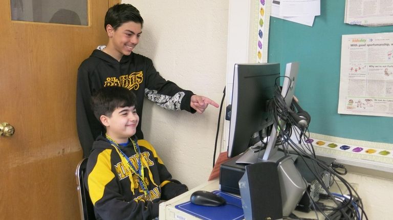Kidsday Reporters Sam Saldarelli, left, and Evan Barraco