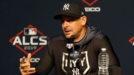Yankees manager Aaron Boone speaks to the media