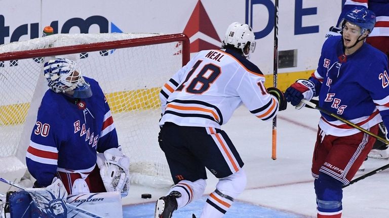 Rangers goaltender Henrik Lundqvist and center Brett Howden