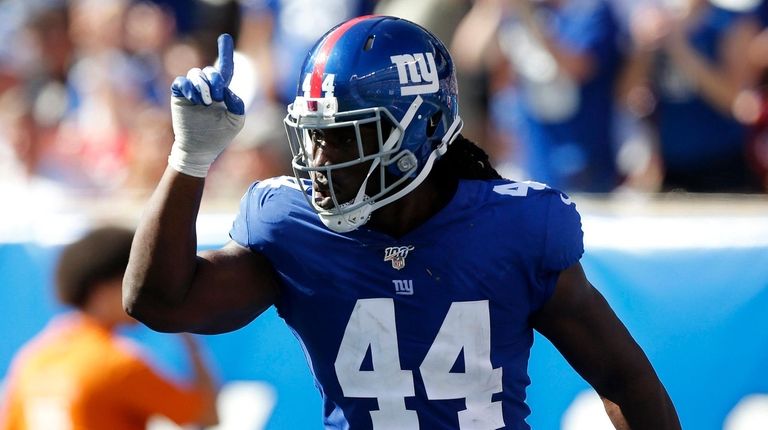 Markus Golden of the Giants reacts during a