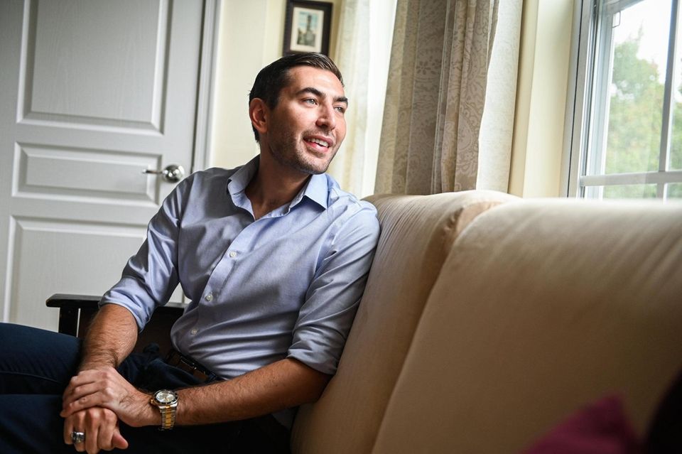 Alex Wallach, a village of Patchogue resident, sits
