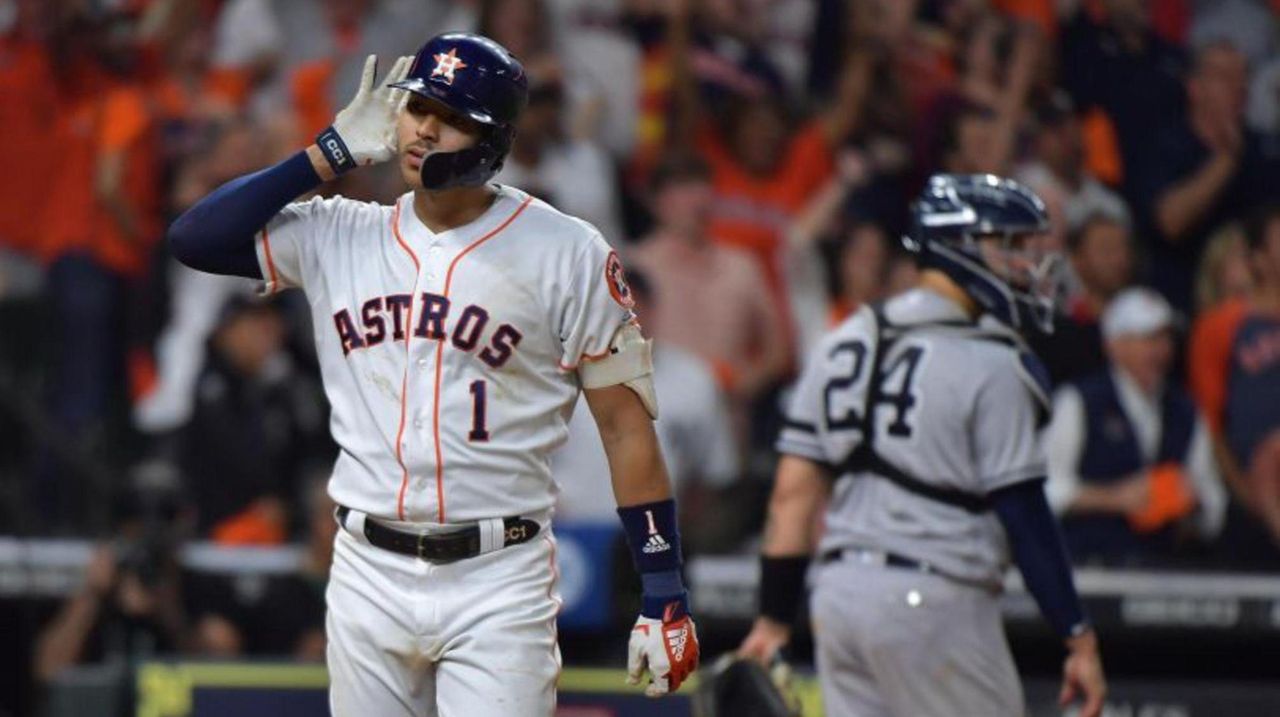 Yankees lose ALCS Game 2 on Carlos Correa's homer off J.A. Happ in 11th