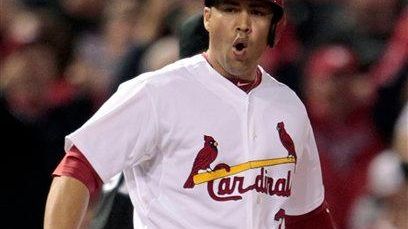St. Louis Cardinals' Carlos Beltran yells after hitting