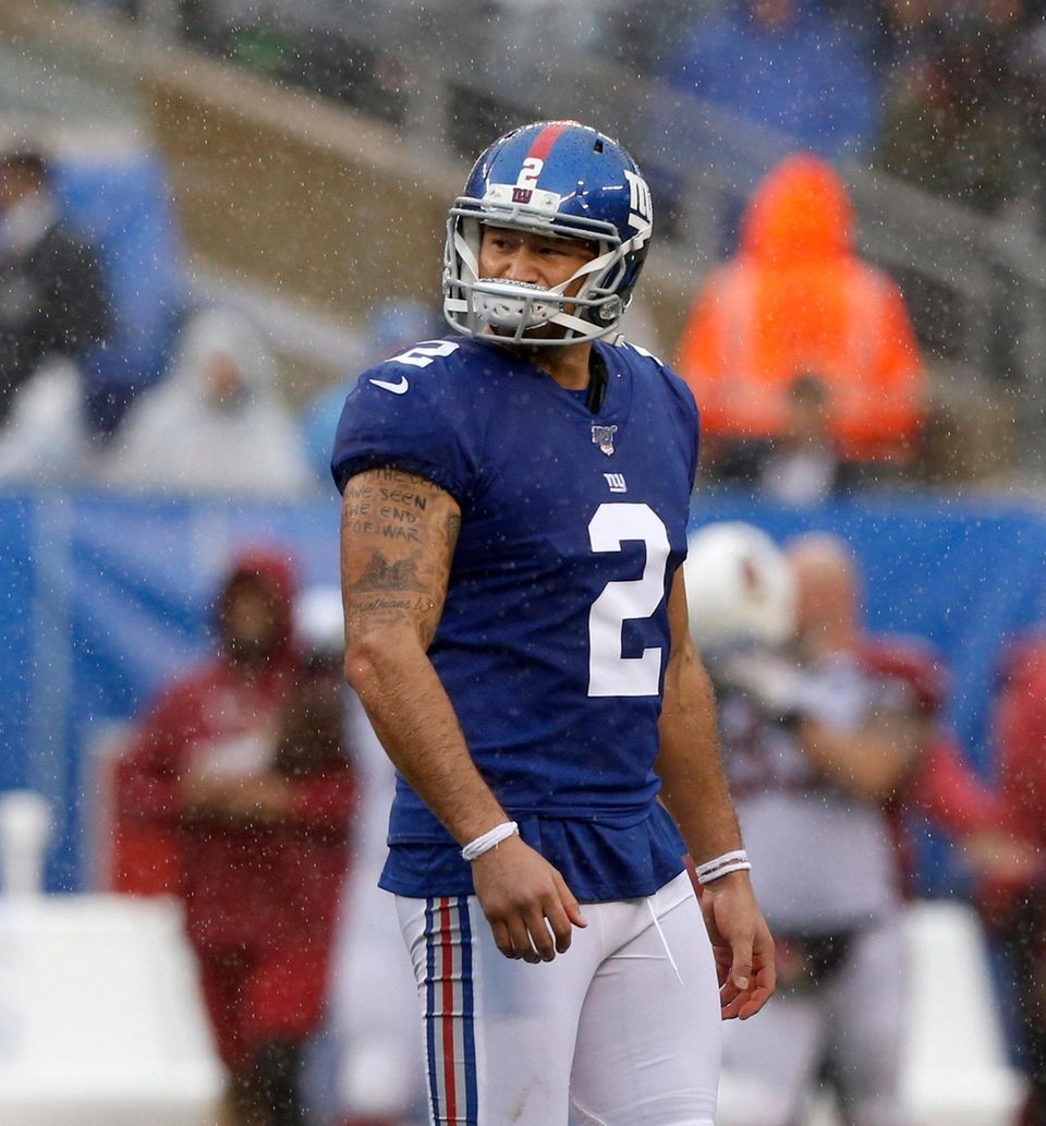 Aldrick Rosas of the Giants looks on after