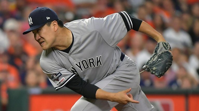 Yankees starting pitcher Masahiro Tanaka pitches in the