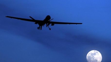 An unmanned U.S. Predator drone flies over Kandahar