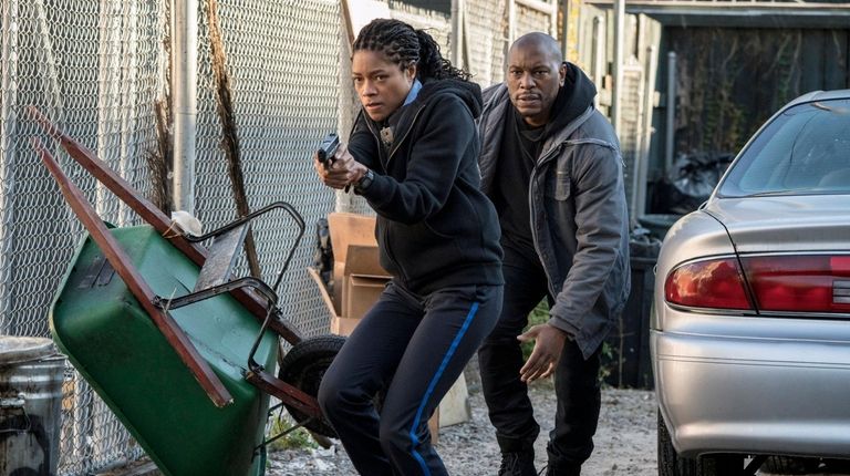 Naomie Harris and Tyrese Gibson in "Black and