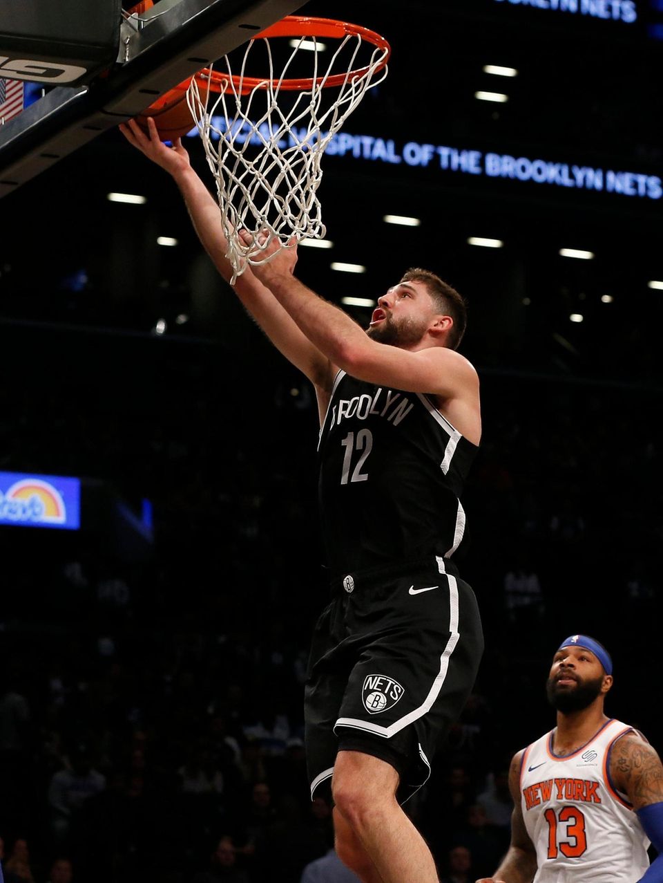 Joe Harris #12 of the Brooklyn Nets goes
