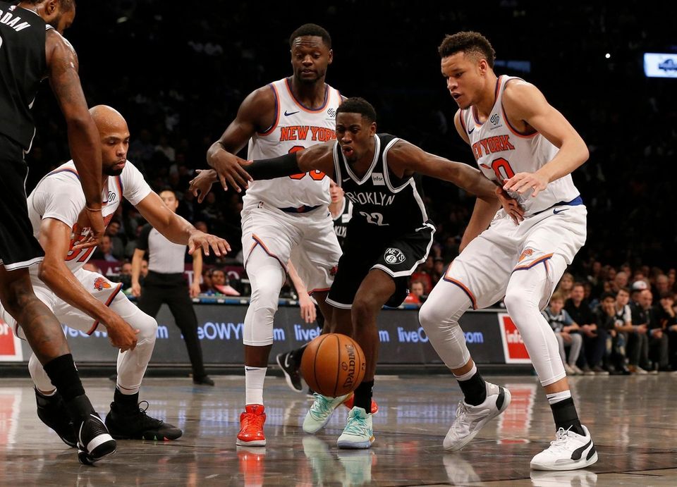 Caris LeVert #22 of the Brooklyn Nets loses
