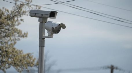 A red-light camera at Indian Head Road and
