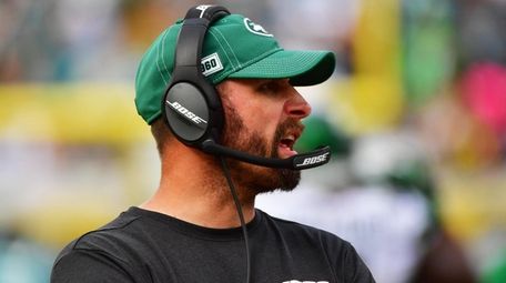 Jets head coach Adam Gase talks on his
