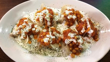 A delectable plate of mantoo--Afghani dumplings here stuffed