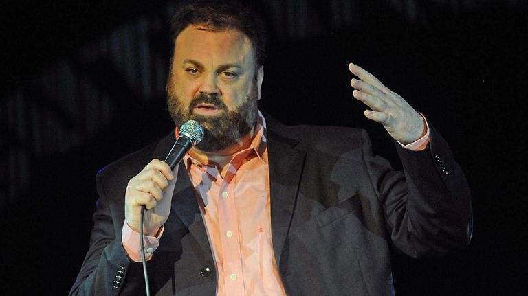 Comedian Chris Roach performs at Comics for a