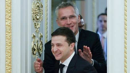 Ukrainian President Volodymyr Zelensky, foreground, and NATO Secretary-General