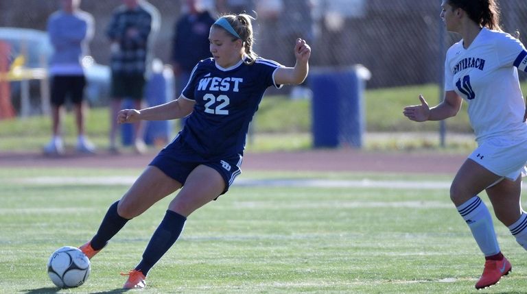 Jennifer Kruszewski of Smithtown West keeps the ball