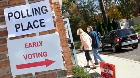 Voters arrive for the first day of early