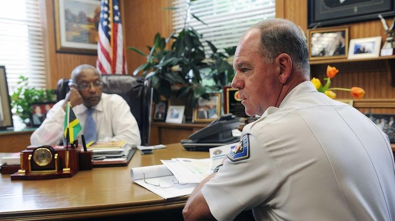 Hempstead Mayor Wayne Hall, left, and Hempstead Police