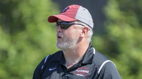 Plainedge's head coach Rob Shaver watches the team