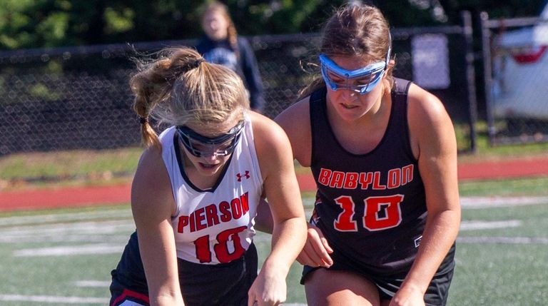 Pierson's Emma Racelles, left, battles with Babylon's Alessandr