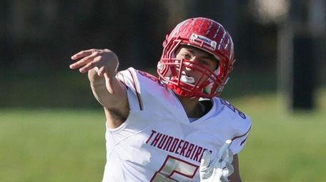 Connetquot's Drew Guttieri throws a pass in the