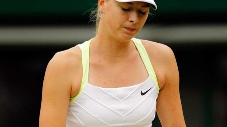 Maria Sharapova of Russia looks down during a