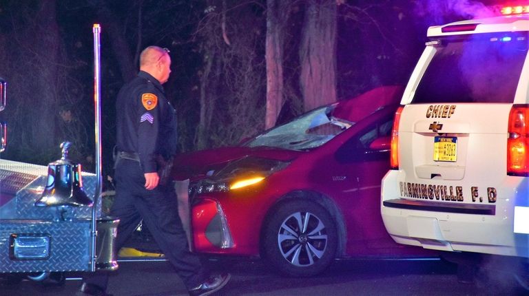 A Suffolk police officer at the scene in