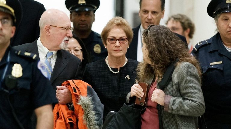 Marie Yovanovitch, center, former U.S. ambassador to Ukraine,
