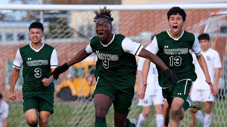 Brentwood forward Nathaniel Austin reacts after scoring the